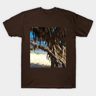 Tree trunks at Watu Karung sand beach T-Shirt